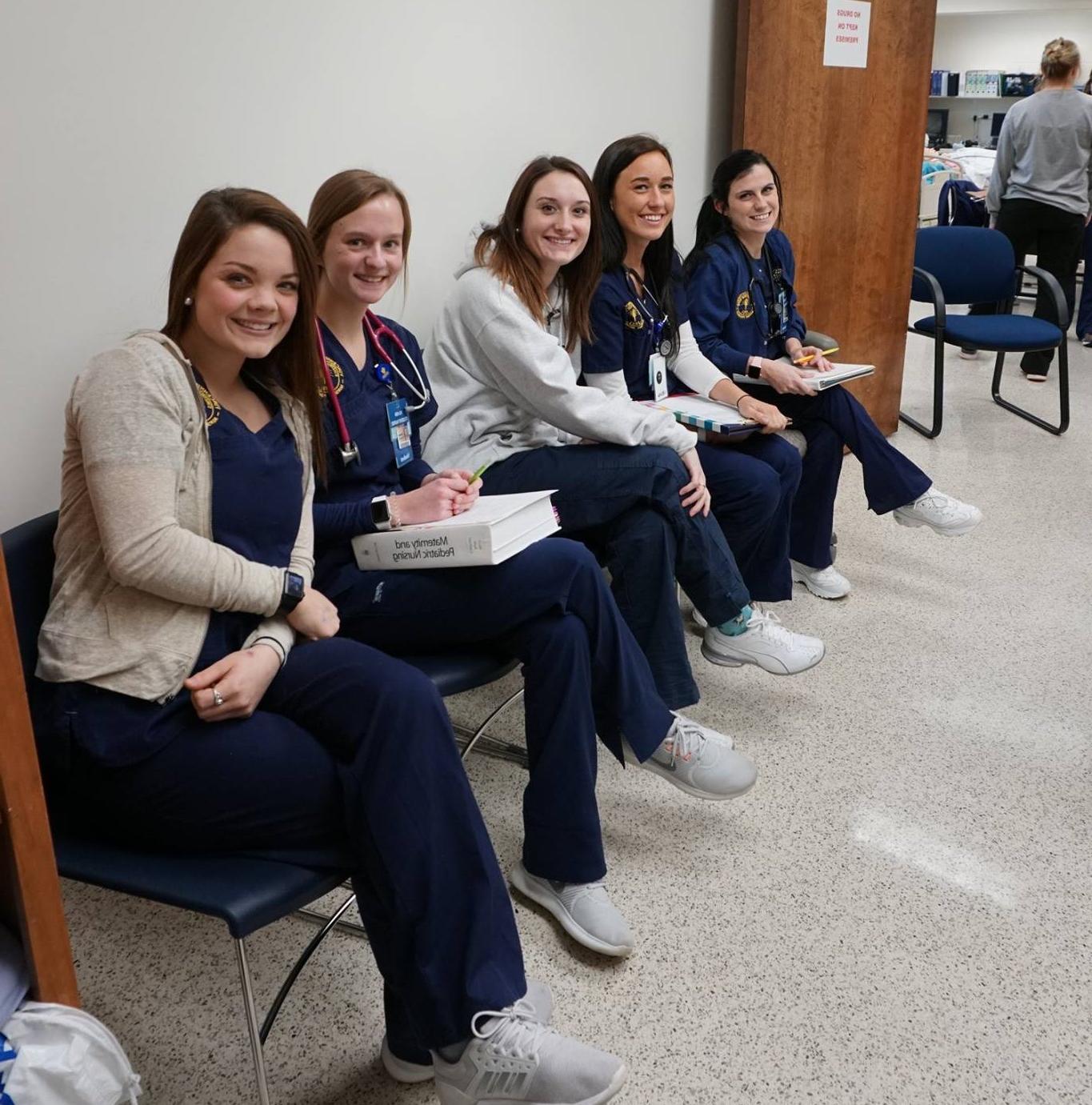 Nursing students sitting down